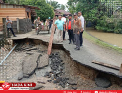 Pj Bupati Aceh Jaya Tinjau Jalan Desa yang Ambruk Akibat Banjir