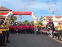Sambut HUT Bhayangkara Ke 79, Polres Aceh Jaya Gelar Fun Walk